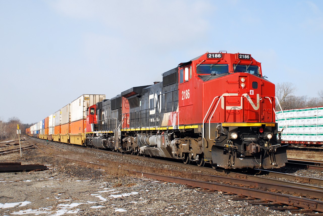 A frosty 148 cruises through Brantford on a bitterly cold day. It was nice to see the train without any mixed freight on the head end.