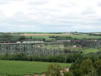 Eastbound CN mixed freight 308 crosses the Salmon River trestle between Grand Falls NB and Plaster Rock NB on the Napodogan Subdivision across New Brunswick.