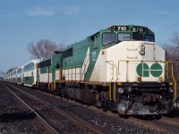 GO 710 shoves an eastbound GO train out of the station at Rouge Hill