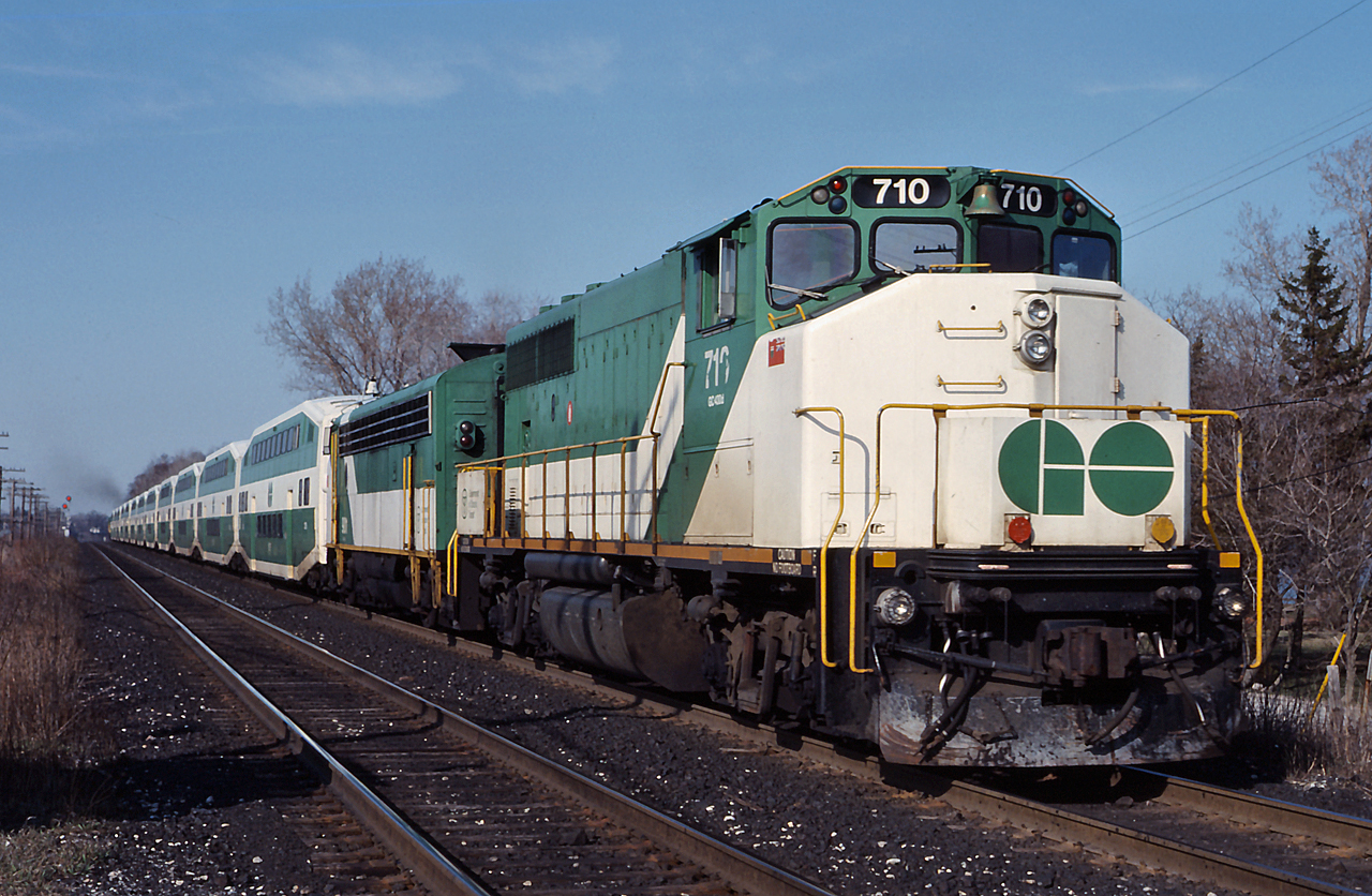 GO 710 shoves an eastbound GO train out of the station at Rouge Hill