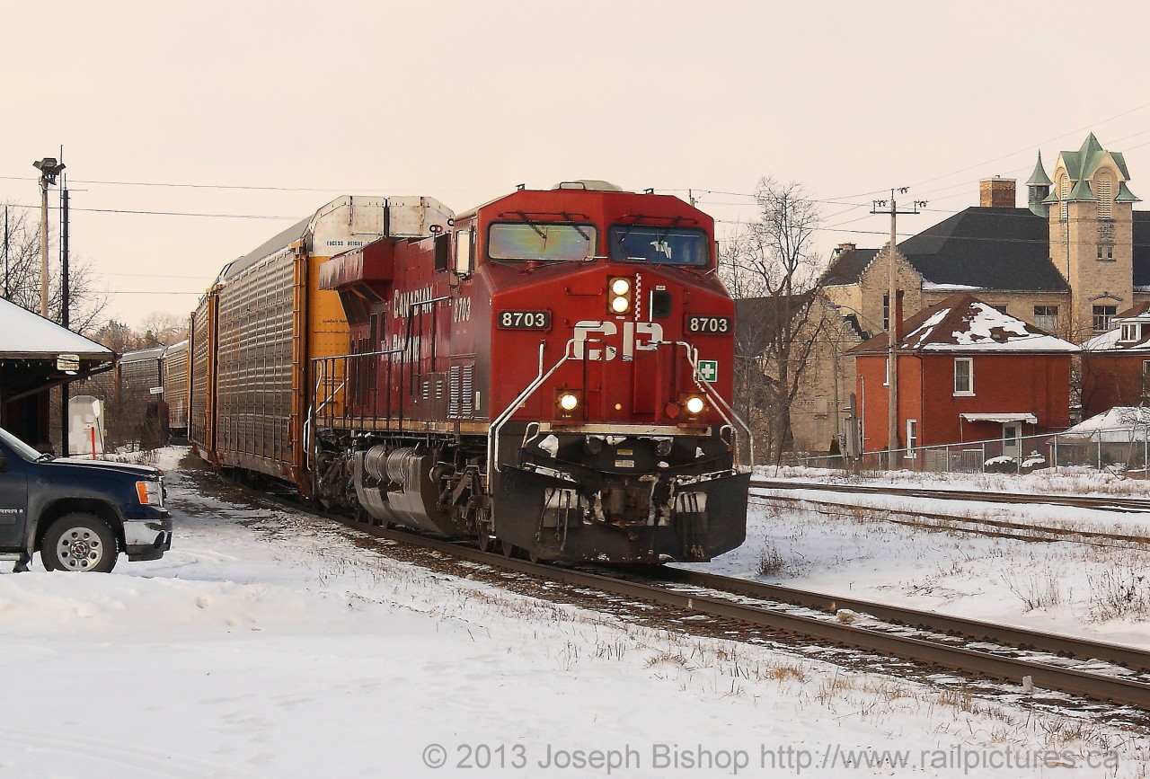 CP 8703 leads train 234 through Cambridge on a chilly morning.  This ES44AC was having no problem keeping its long train at track speed.