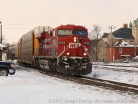 CP 8703 leads train 234 through Cambridge on a chilly morning.  This ES44AC was having no problem keeping its long train at track speed.