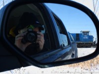 While driving away from Garnet I tried a different shot.  SOR 597 was making their way across the level crossing and CEFX 2014's cab was nicely framed in my rear view mirror on the truck.