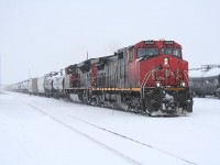 Railroading is an all weather operation, and while the OPP might be a bit busier this afternoon responding to highway incidents, a little bit of snow doesn't even faze the crew of CN 393 as they clear the customs scanners and depart Sarnia for Port Huron, MI.