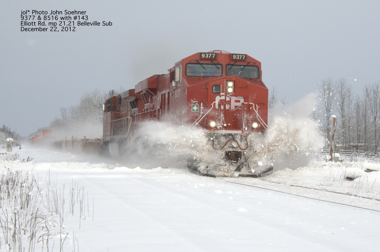 December 22, 2012 CP train #143 with 9377 "busts" through drifts at Blackjack Crossing, Elliott Road Crossing, mp 21.21 of the Belleville Sub