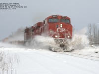 December 22, 2012 CP train #143 with 9377 "busts" through drifts at Blackjack Crossing, Elliott Road Crossing, mp 21.21 of the Belleville Sub