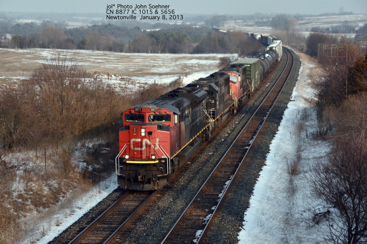 CN manifest freight with CN 8877 IC 1056 & CN 5656 at Newtonville Road January 8, 2013.