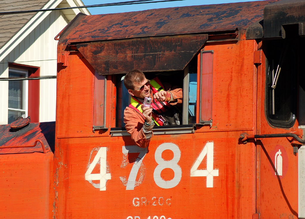 Brakeman Mark seems to be having some fun with the photographers..