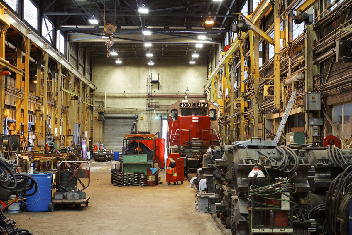 A look inside of Ontario Northland's Diesel Shop in North Bay, Ontario. Hiding amongst equipment is GEXR 4019, an EMD GP40 that has apparently been here since 2009. *Photograph taken with permission, while on a tour provided by ONR*