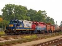 RLK 1755 - SOR 5005 and Stelco 453 - 85 bring up the rear of CN X555 as it departs the Brantford yard for Hamilton