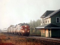 The overnight fog saved the bacon for this image of the North-bound Algoma Central Tour Train on this first of October fall morning. The train otherwise would appear almost directly out of the morning sun, making this run to Searchmont photographically a bit of a downer.  Instead, a rather nice shot of AC 1750, 1756, 1754, 1755 & 1751 with a long train rolling by the old boarded up station. AC units were formerly CN 6502, 6553(CP4103/1404) 6525, 6531 and 6506. I believe these units since have all found homes Stateside, having seen a few of them recently on the Keokuk Jct.Rwy, out of La Harpe, Ill.  I am, however, interested in the status of the old Searchmont depot.