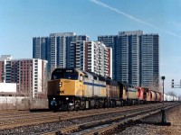 Back in those delightful days (for the fans) of no-end CP leasing, we see the Guelph Jct. turn westbound for the Jct with VIA 6456, HATX 216, VIA 6455 and CP 8241 passing thru Etobicoke on a crisp, clear March 12, 1995. This train wyed their power at Guelph Jct. before heading back east.  Yes, it was power worth following.