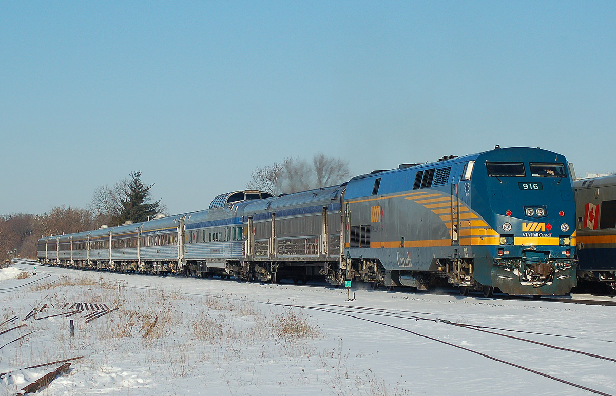 #70 arrives at Brantford with a full stainless consist including Evangeline Park