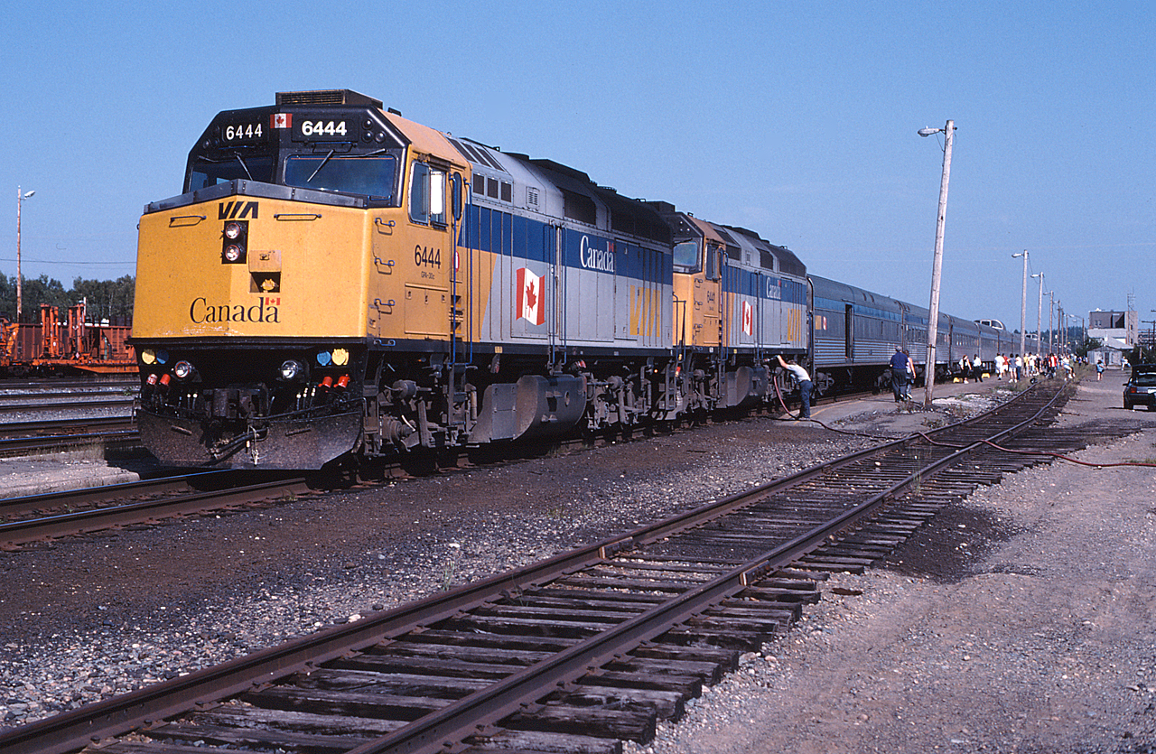 The Canadian takes on fuel and changes crews, while passengers take the opportunity to stretch their legs before the scenic ride into a Northern Ontario sunset.
