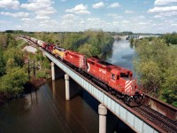 When the CP was awash in leasers in the mid-90s, it was a great time to be trackside. This is a typical lashup; westbound over the Thames River as seen from the highway 59 bridge, a rather popular railfan location during mid afternoons.  Power on this train is CP 5612, 5643, GATX 901 and HLCX 6203.