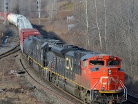 CN 148 glides through Hamilton West with 8893 and IC 1036 on a warm January morning.