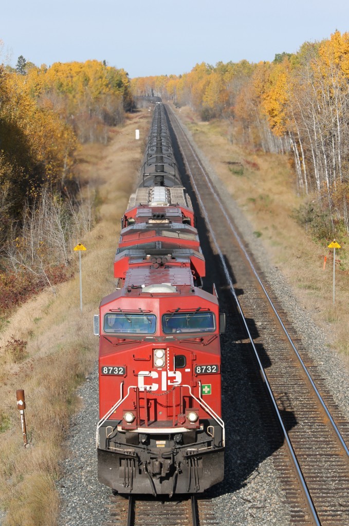 Canadian Pacific train #608 - unit train of crude oil - led by CP 8732 and CP 8733 on the approach to Thunder Bay amid the fleeting fall colours of the aspen poplar trees.
