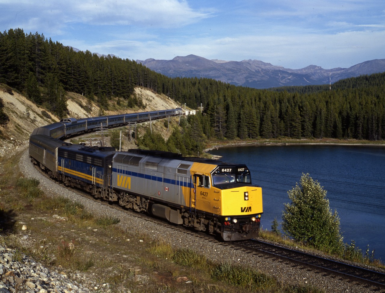 VIA train 1 for Vancouver is passing Sink Lake, just west of the continental watershed and the Alberta-BC border.