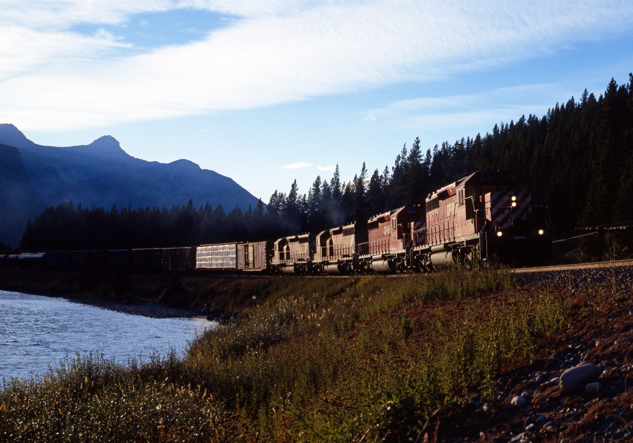 Eastbound CP freight with 4 SD-40's pulling, typical power in those days. Near continental watershed.