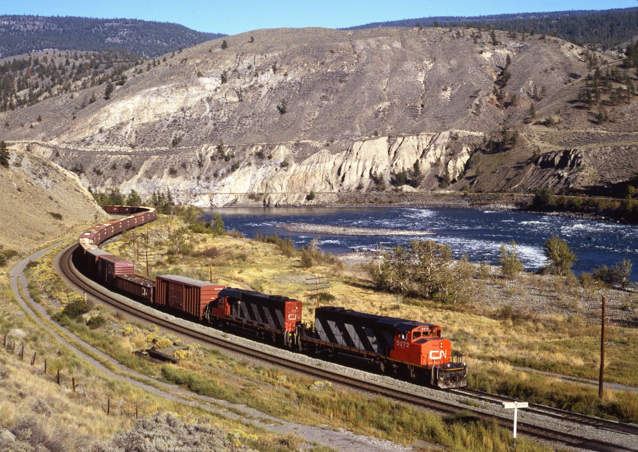 Westbound CN freight just west of Ashcroft BC, running along the Thompson River. CP track is on the opposide side.