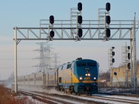 Having just made a station stop in Aldershot VIA 908 blasts through Burlington West kicking up fresh powder on it's way east.
