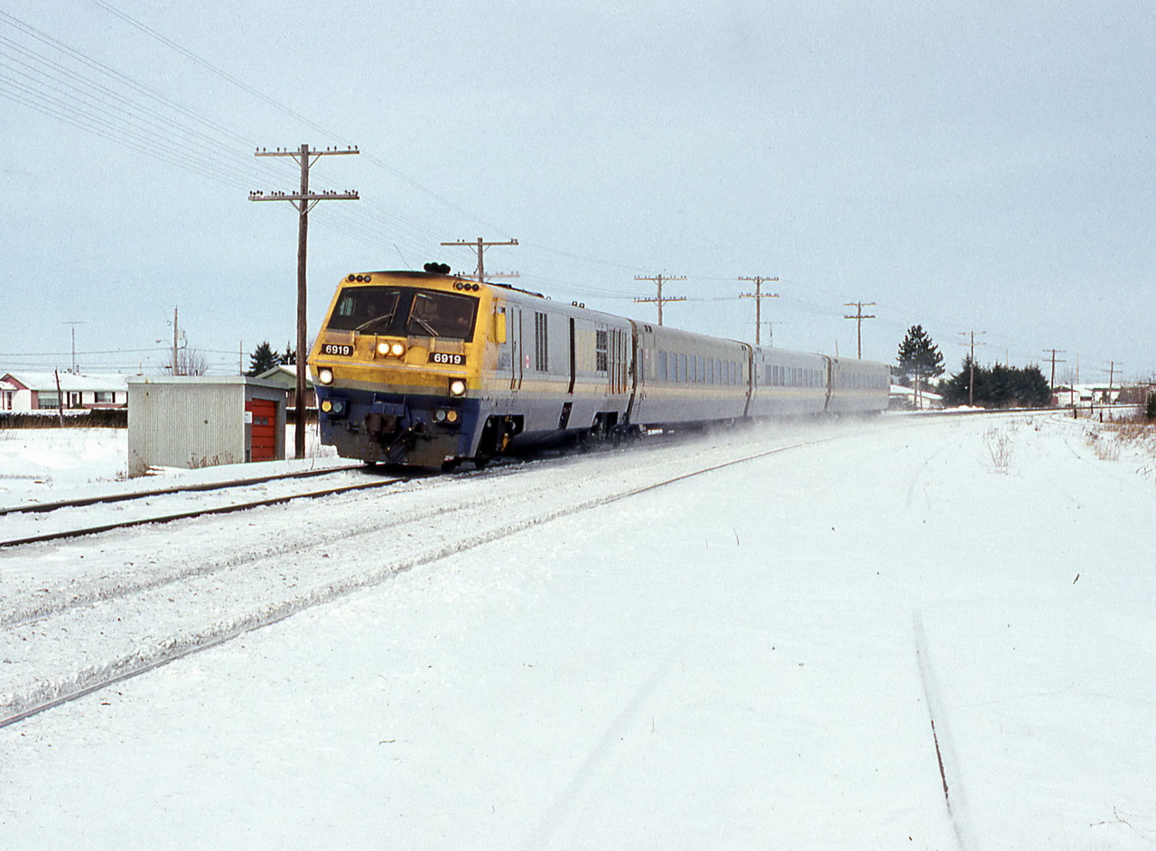 VIA 23 raises a snow dust at c 75mph.