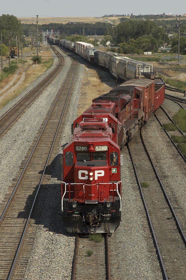 SD40-2 #5790 leads a sister and an SD90MAC through the switches and into the yard at Swift Current.