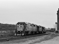 
Nearly new ONR GP 38-2 (GMD November 1982) #1806 leads ten year old SD40-2 #1731 - #1730 (GMD March 1973) on a northbound ore train departing North Bay. 
<br>
<br>
March 22, 1983 negative by S.Danko.
<br>
<br>
More at North Bay: 
<br>
<br>
<a href="http://www.railpictures.ca/?attachment_id=8056"> Via Rail #1 powered by ex CP Rail FP7-A #1424  </a>
<br>
<br>
sdfourty