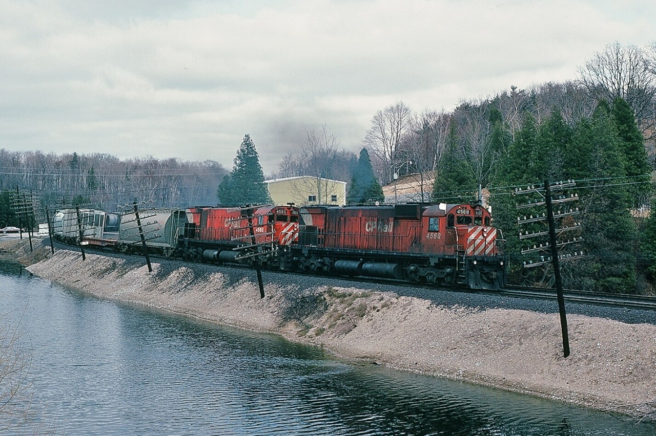 M for Magnificent. Under load, the ALCO design MLW M series are pure music to the ALCO fan ear.
 CP Rail Extra 4568  west  powered by two M630 units  4568 -  4565  working the Galt  Subdivison  westbound Campbellville (mile 37.8)  grade.  April 1980 Kodachrome by S. Danko.
 More Magnificent M units:

 two west at Leaside  

 trio departing Agincourt east  

 trio departing Agincourt east  

 more departing Agincourt east  

sdfourty.