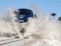 Canadian winter! Amtrak #194 is smashing the snow on the CN Rouses Point Subdivision.