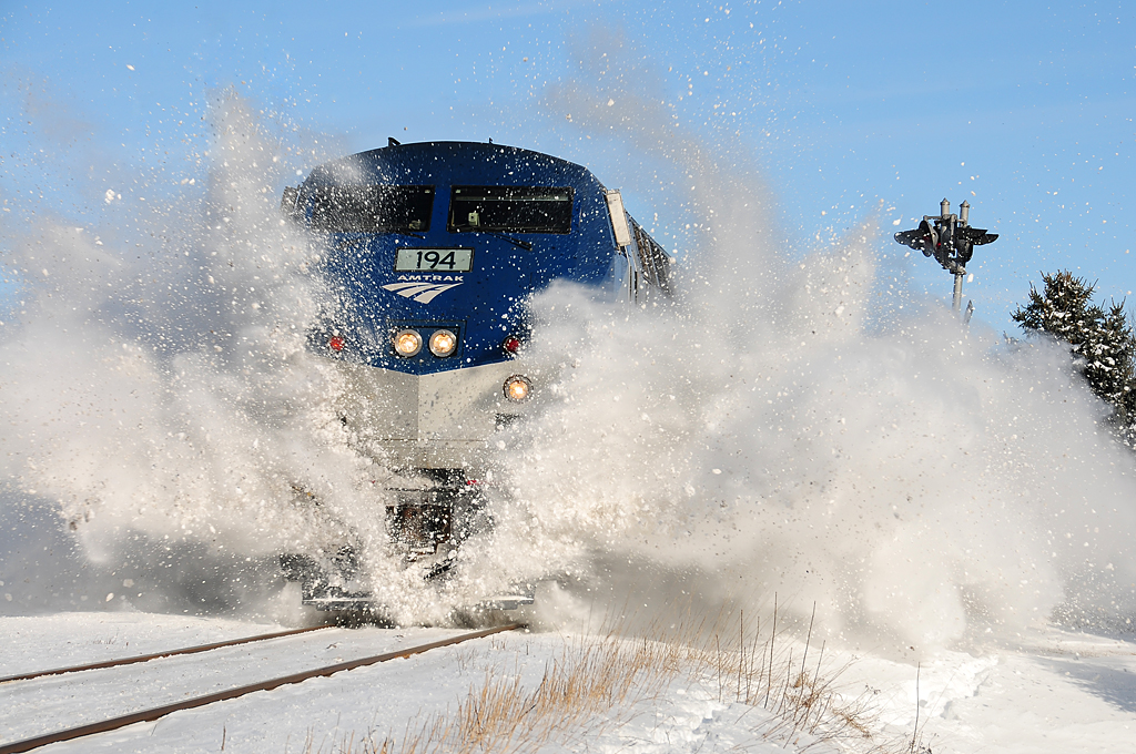 Canadian winter! Amtrak #194 is smashing the snow on the CN Rouses Point Subdivision.