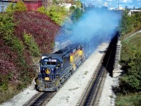 B&O 4057 with B&O 4017 and C&O 3787 charge out of the Detroit River Tunnel with train 934 November 1, 1982.