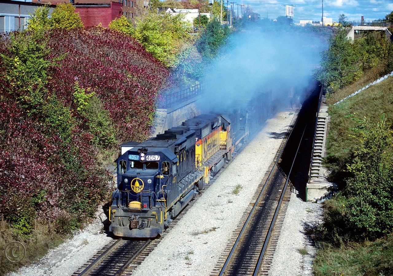 B&O 4057 with B&O 4017 and C&O 3787 charge out of the Detroit River Tunnel with train 934 November 1, 1982.