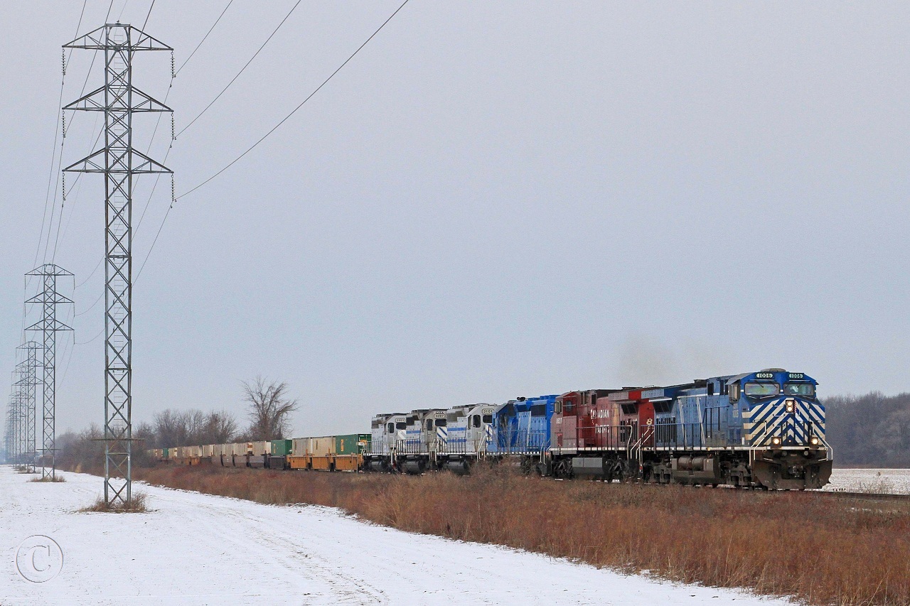 CEFX 1006 with CP8627, CEFX3163, CITX3101, 3097 and 3091 lead Toronto bound train 282 at mile 98.88 on the CP's Windsor Sub. Thanks for the head-up Geoff.