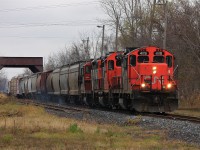 CN 439 arrives into Chatham with an all EMD treat just as it approaches the former CSX diamond at Chatham East. A few cars back a noticeable leak can be seen in one of the hoppers.