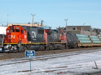 One of CN's shiny "new" ex-Oakway SD60s leads an almost entirely pipe train West out of Walker yard.