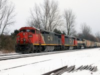 CN 397 had a rare visitor to Ontario on Feb 11, 2013 as seen here at Copetown, ON.  
The 2454 was followed by BCOL 4615 and BNSF 9607 in the Exectutive paint scheme.  
It has been quite some time since we have seen BNSF visitors on the Dundas Sub. 
Unfortunately, 397 came along just before a short cloudburst.  The sun would poke out a few minutes later.  