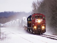 A beater SD40-2 leads CP DIM-005; a unit train of windmill blades bound for Welland, ON. Consist is CP 5773-DME 6054.