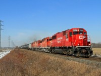 A rather spring-like morning sees CP 6223 with trailing SD40-2's 5929, 6021 and 5972 hustle train 642 eastward at mile 98.88 on the CP's Windsor Sub. Nice to see an all EMD consist these days.