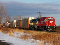 CP tank train #641 is leaded by some beautiful EMD power as the Winter sun starts to set on the horizon. This train will meet intermodal CP 142 at Tilbury which also had an ex SOO Line SD60 trailing.