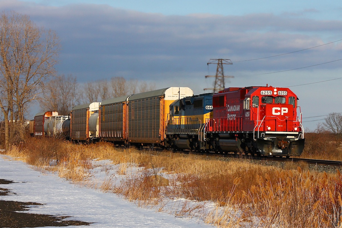 CP tank train #641 is leaded by some beautiful EMD power as the Winter sun starts to set on the horizon. This train will meet intermodal CP 142 at Tilbury which also had an ex SOO Line SD60 trailing.