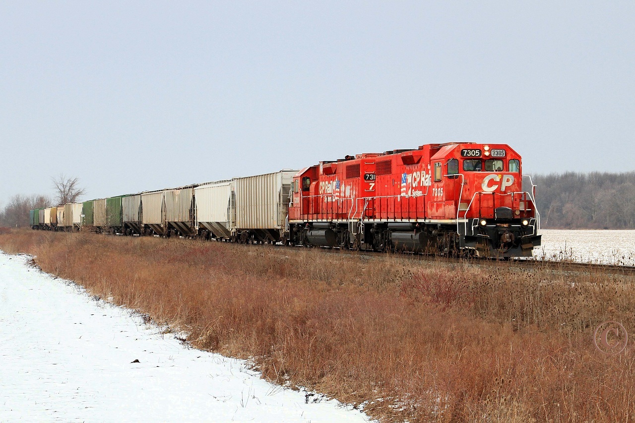 Ex D&H CP 7305 and 7310 lead train T76, the Chatham turn, at mile 98.88 on the CP's Windsor Sub. Thanks for the heads-up Geoff.