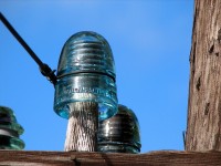 A Canadian Pacific Ry glass insulator still serves its purpose at mile 27.1 on the CP's Nipigon Sub.