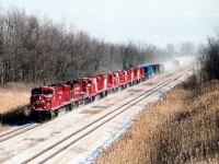The parade of ES44ACs intensifies!!!   CP 8853, 9727 brings more new power delivered to Canada (Fort Erie) by NS from the GE plant in Erie, PA. CP 8863, 8864, 8865, 8866, 8867 and 8862, a few of twenty units beginning at 8858 which sport the Vancouver 2010 Olympic special decals, make their way thru Brookfield en route to Agincourt on a cold blustery afternoon. Upon arrival at destination these new units will be dispersed on various first revenue runs. Units were used mostly on transcontinental trips, and decals were removed after the Olympics concluded.