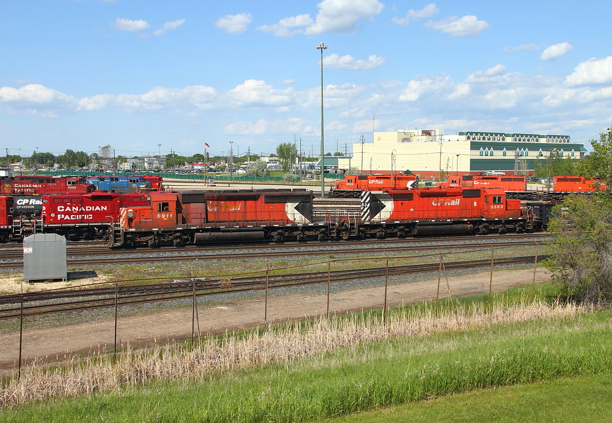 CP 5911 and sister unit CP 5863 work the west end of the yard. These are the only two units on CP's roster that still wear the large multi-mark. After CP settled the labour dispute last year these two units worked together for about a week.