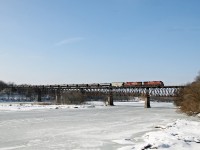 CP 606 crossing the Grand River at Galt on Feb 13/2013. 
As many times as I have been to Galt, this is my first photograph with a train on the bridge. 