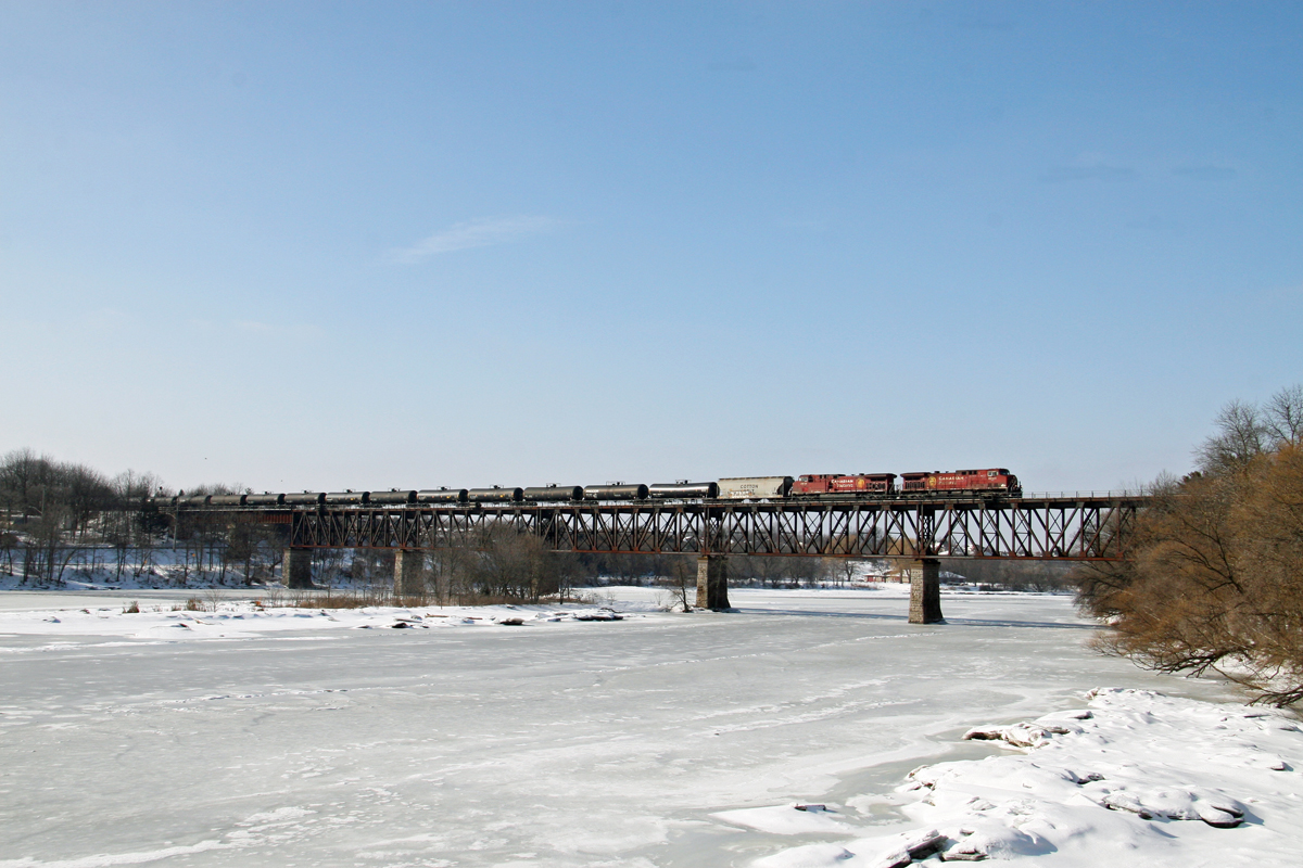 CP 606 crossing the Grand River at Galt on Feb 13/2013. 
As many times as I have been to Galt, this is my first photograph with a train on the bridge.