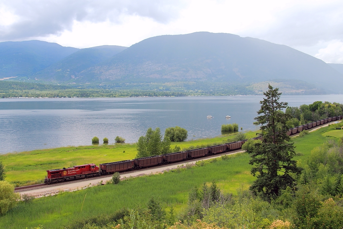 CP 8573 brings up the rear of this empty coal train.