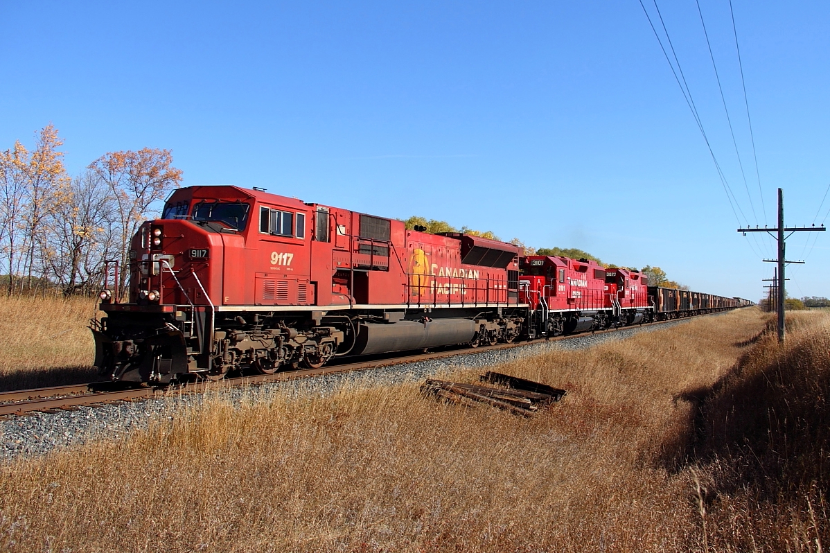 CP 9117 leads two other EMDs through Melbourne.