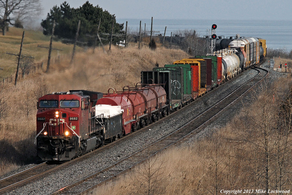 CP train 609 (or maybe 205) rolls past the siding at Port Hope. Considering it's a one unit wonder, they're making good time with the 110 car train, and seemed to keep that pace going all the way up to Newtonville. 1416hrs.